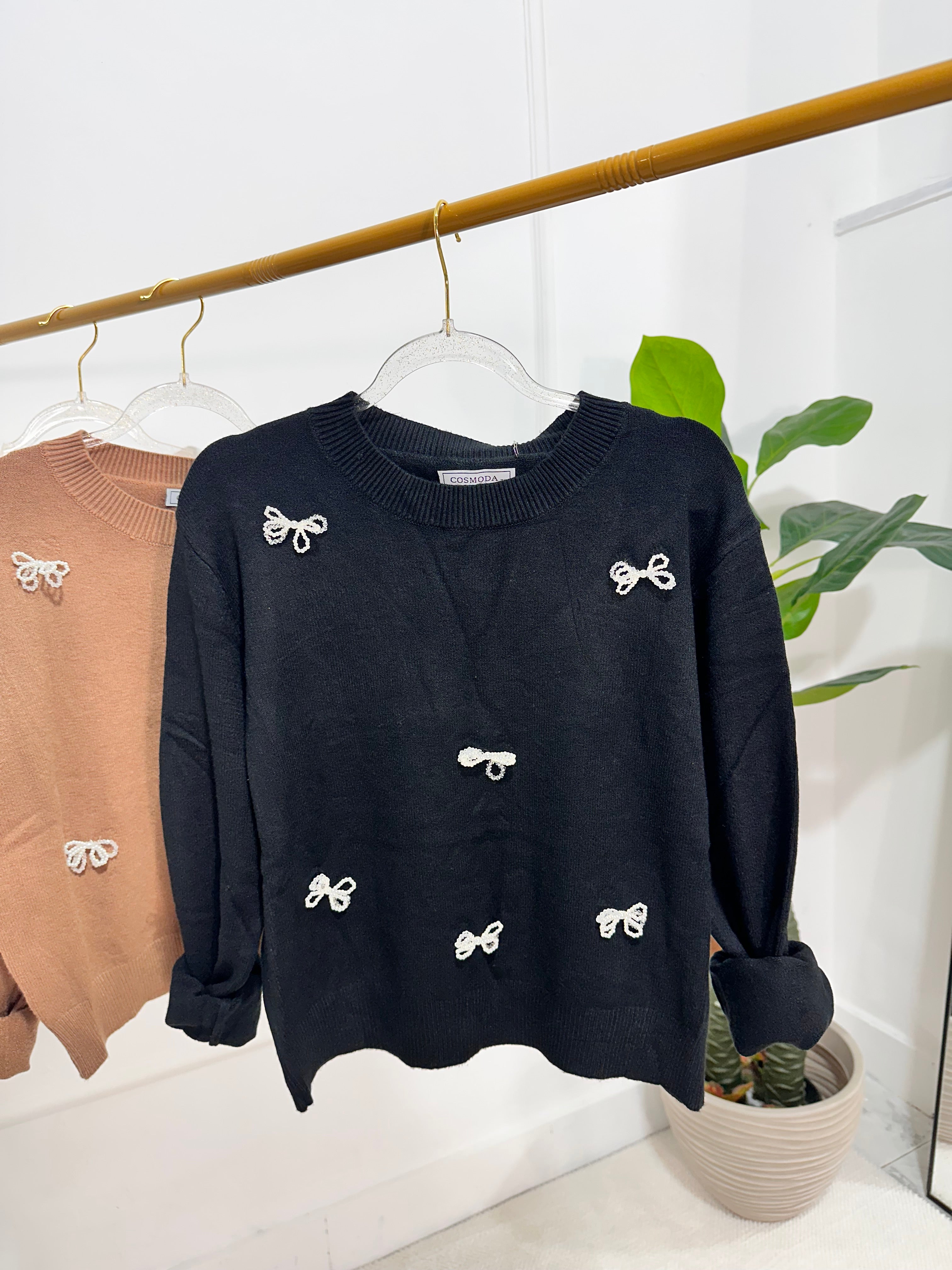 Pull con fiocchi in perline
