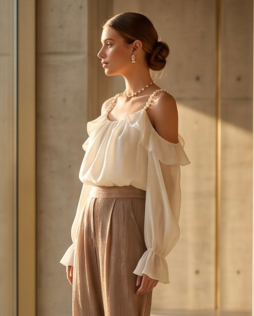 Blusa lumina con perle vaniglia