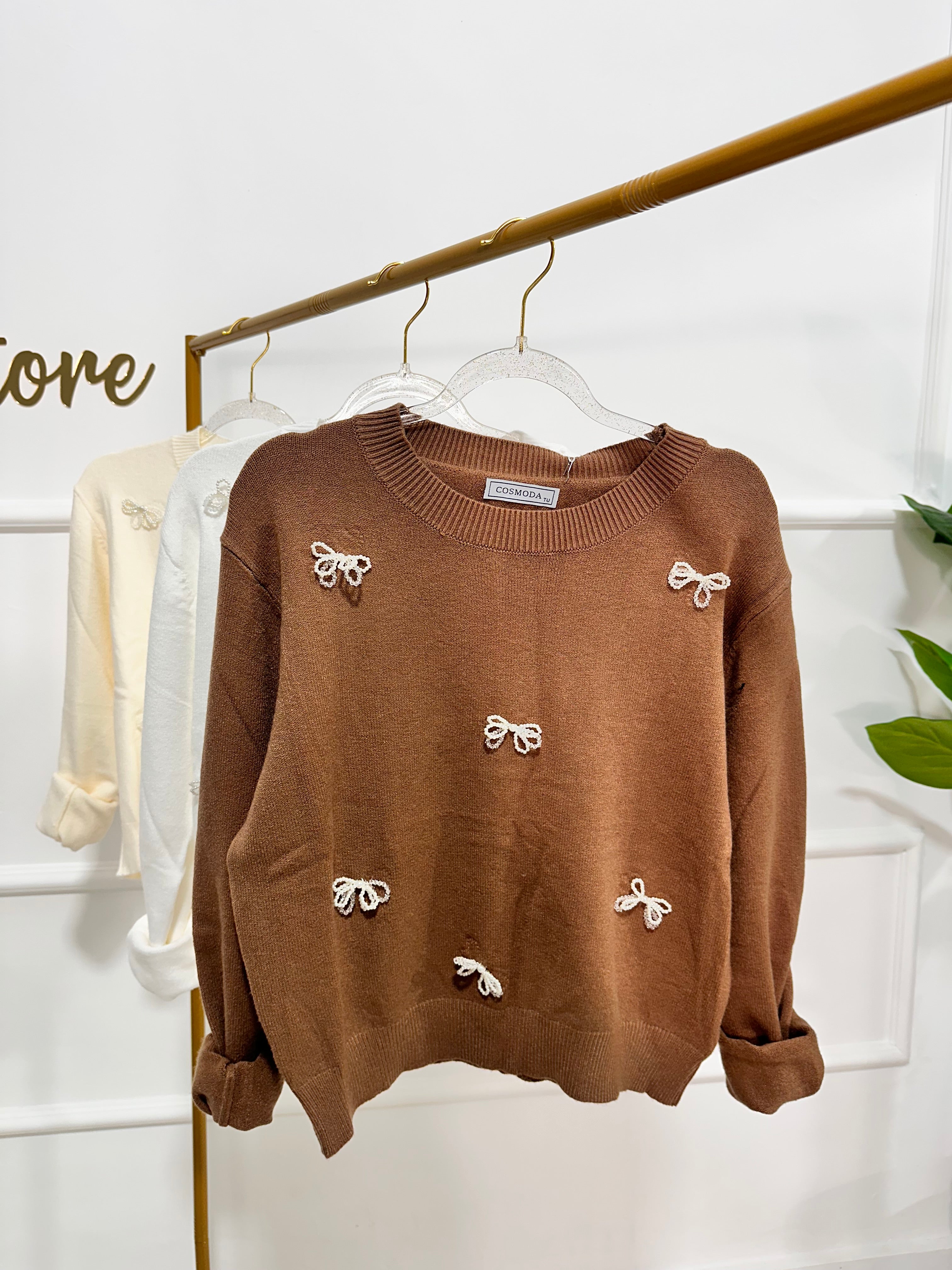 Pull con fiocchi in perline