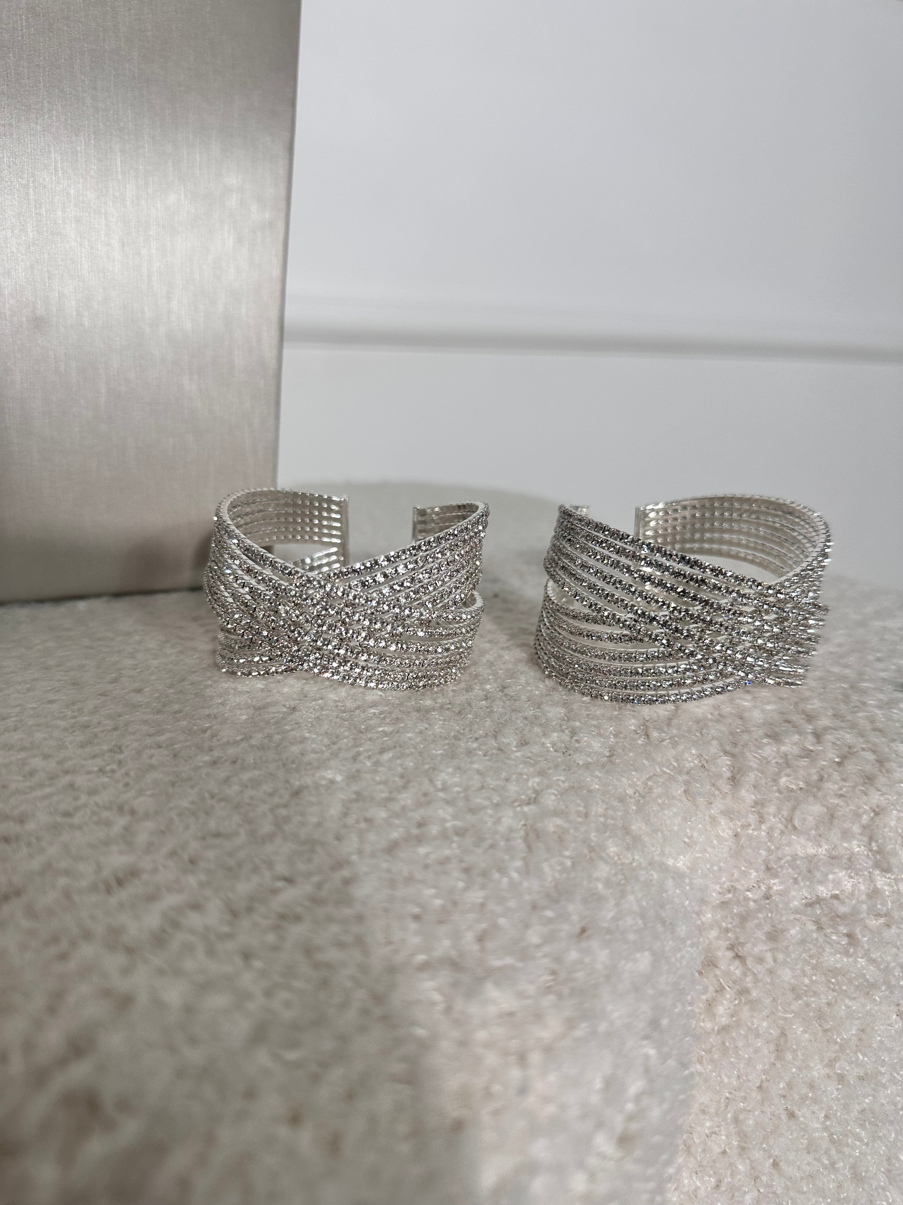 Bracciale rigido incrocio